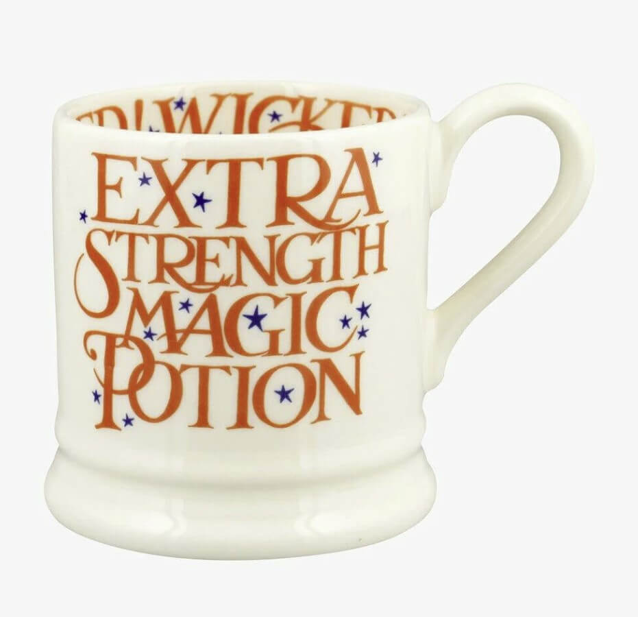 white mug with orange text 'extra strength magic potion'