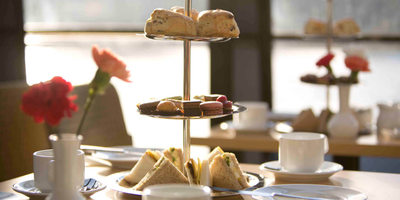 Enjoy An Afternoon Tea Aboard City Cruises as the boat sails down the River Thames and past St Paul's Cathedral 