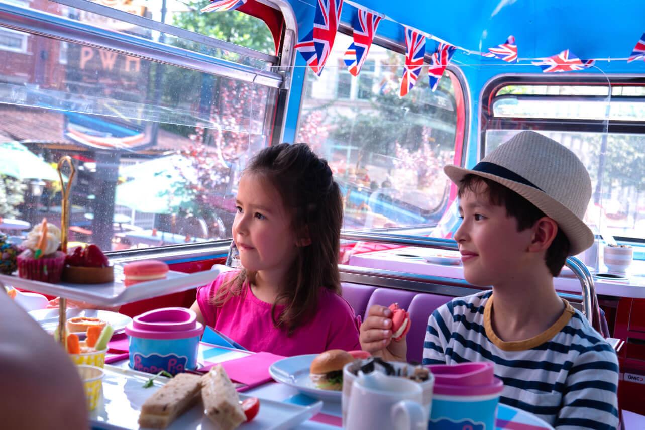 Children enjoying the Peppa Pig themed Afternoon Tea aboard the B Bus