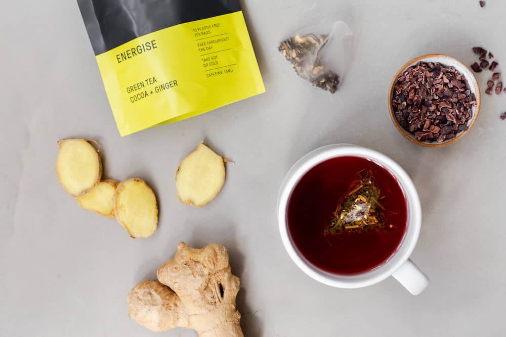 cup of tea, fresh ginger, tea pouch