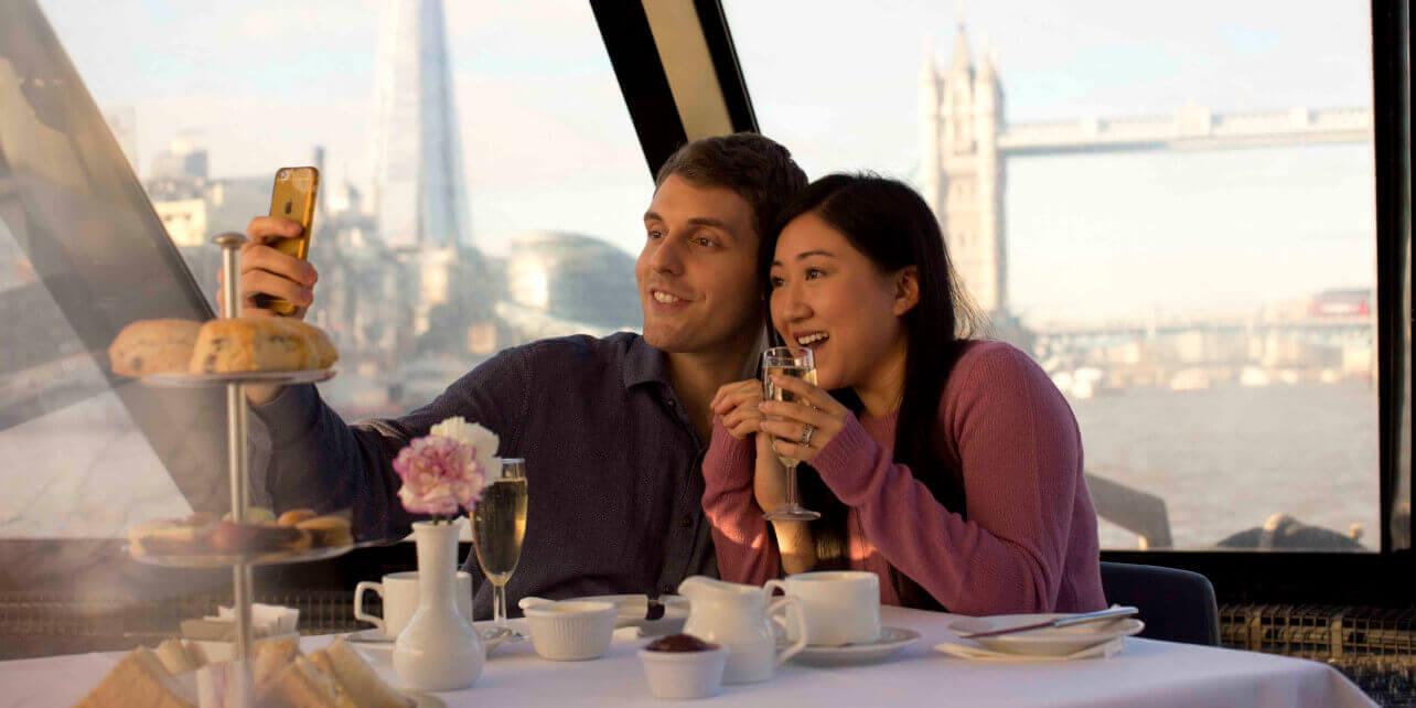City Cruise Afternoon Tea Tour sails down The River Thames and underneath Tower Bridge 